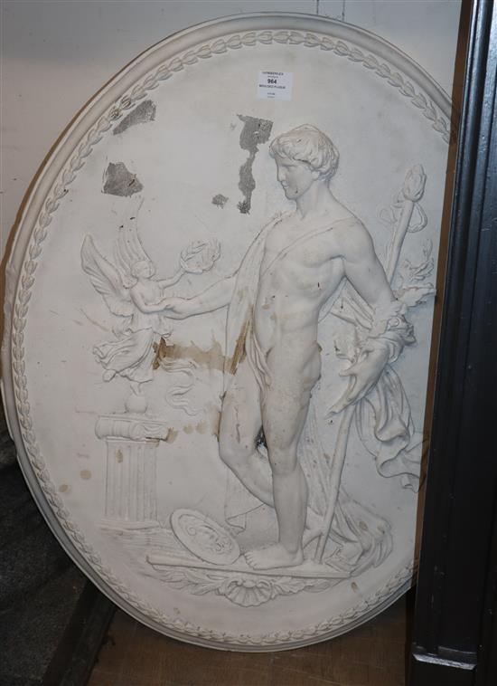 An oval relief moulded plaster classical plaque H.80cm